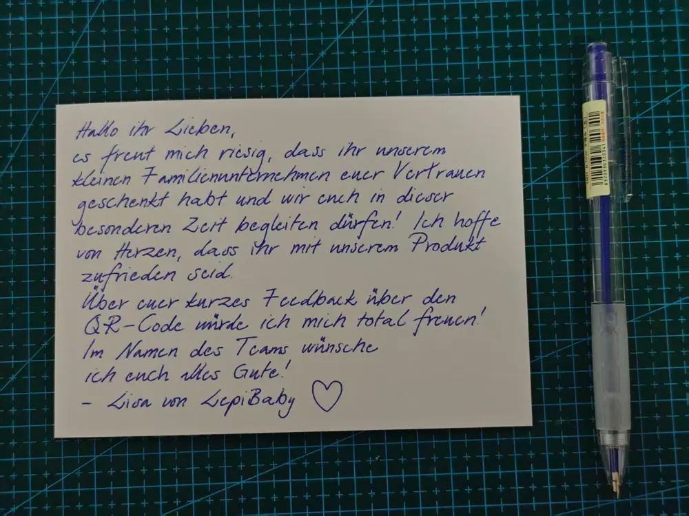 Handwritten thank-you card from a baby brand, ballpoint pen